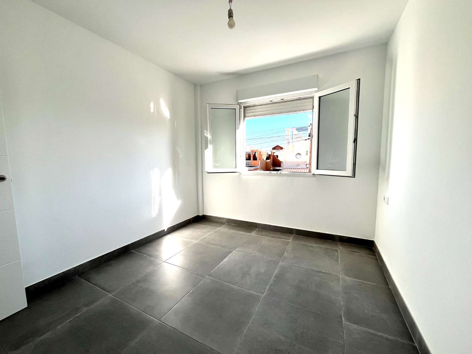 Completely renovated duplex 3 bedrooms, 1 bathroom with solarium