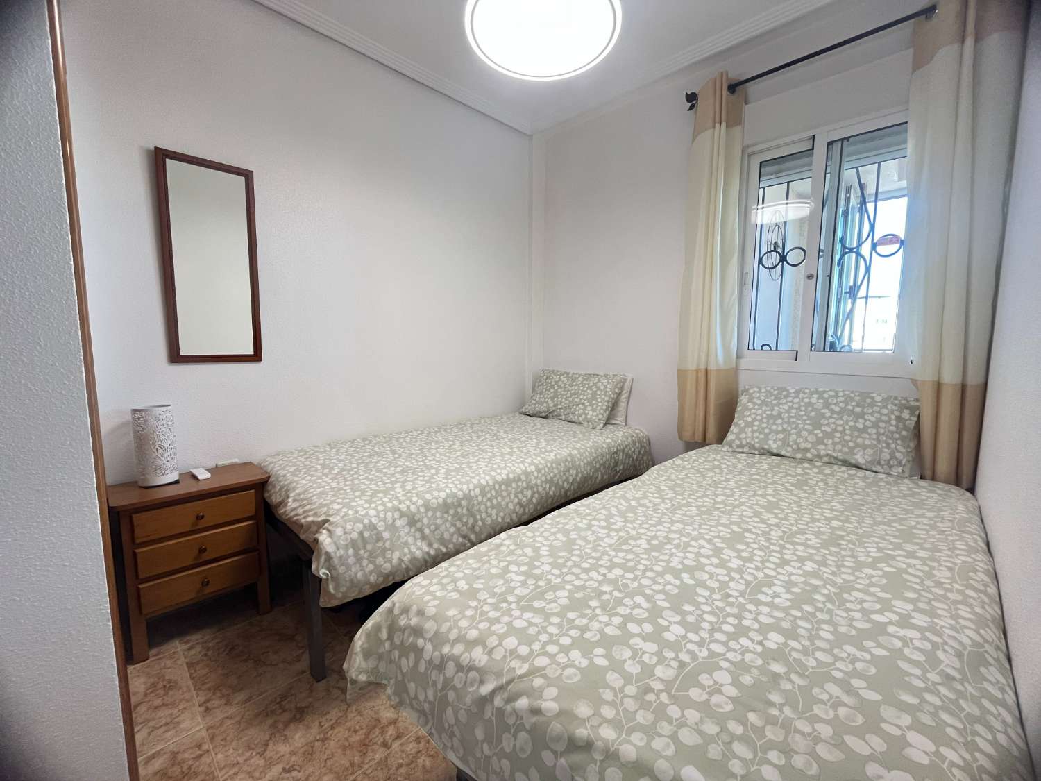 P-1495. Grazioso appartamento con 2 camere da letto.