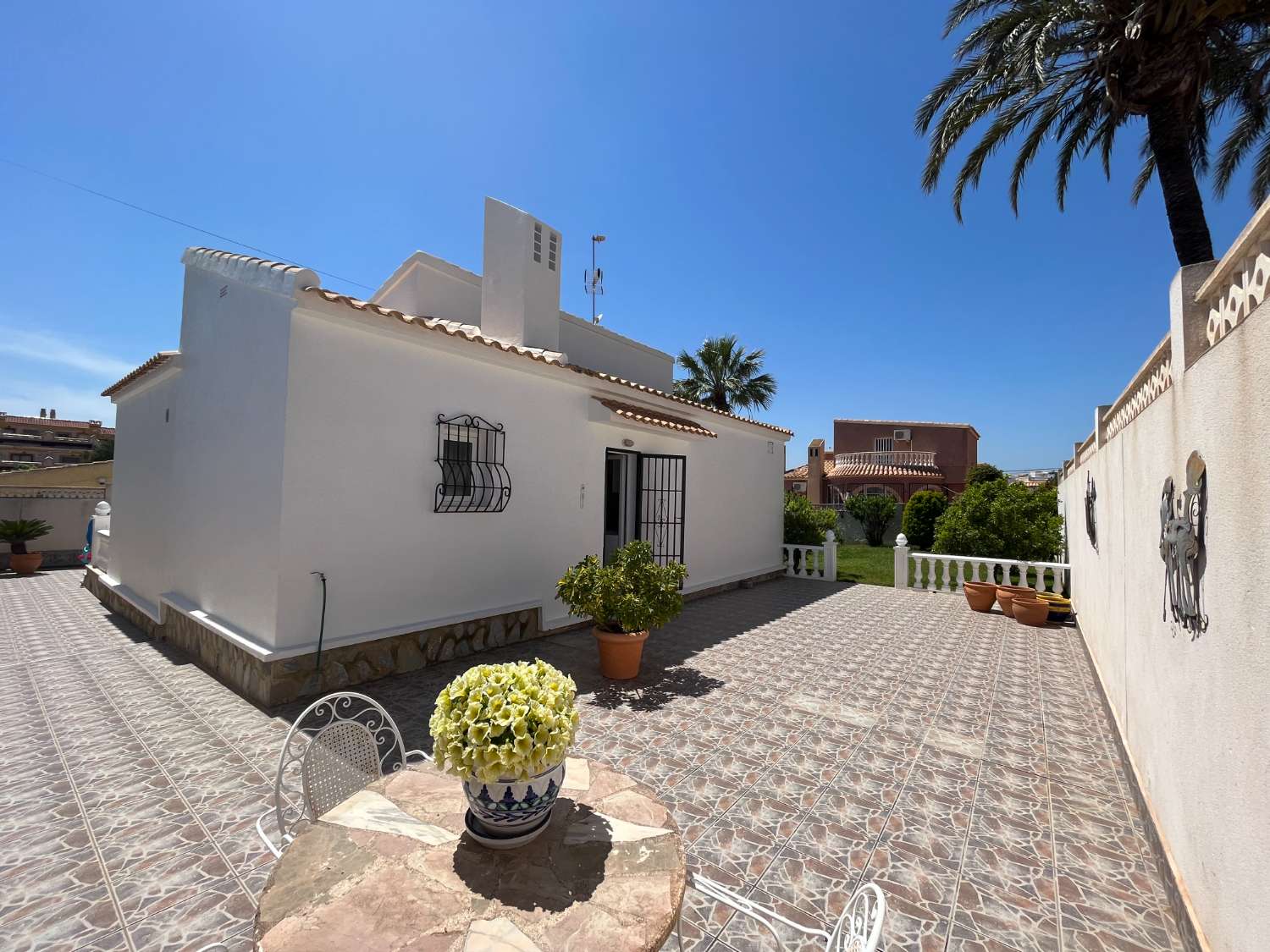 Detached villa distributed on one floor with 2 bedrooms and garage