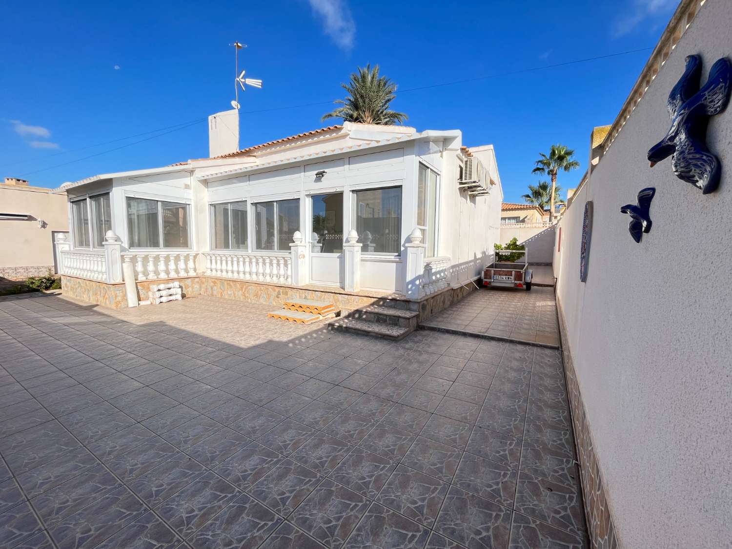 Detached villa distributed on one floor with 2 bedrooms and garage