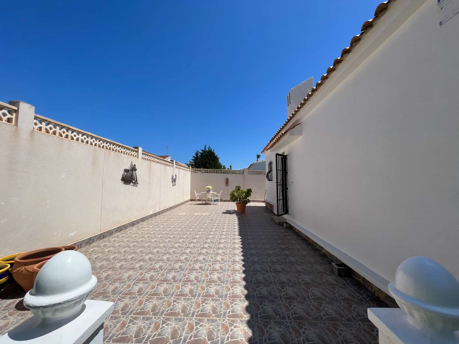 Detached villa distributed on one floor with 2 bedrooms and garage