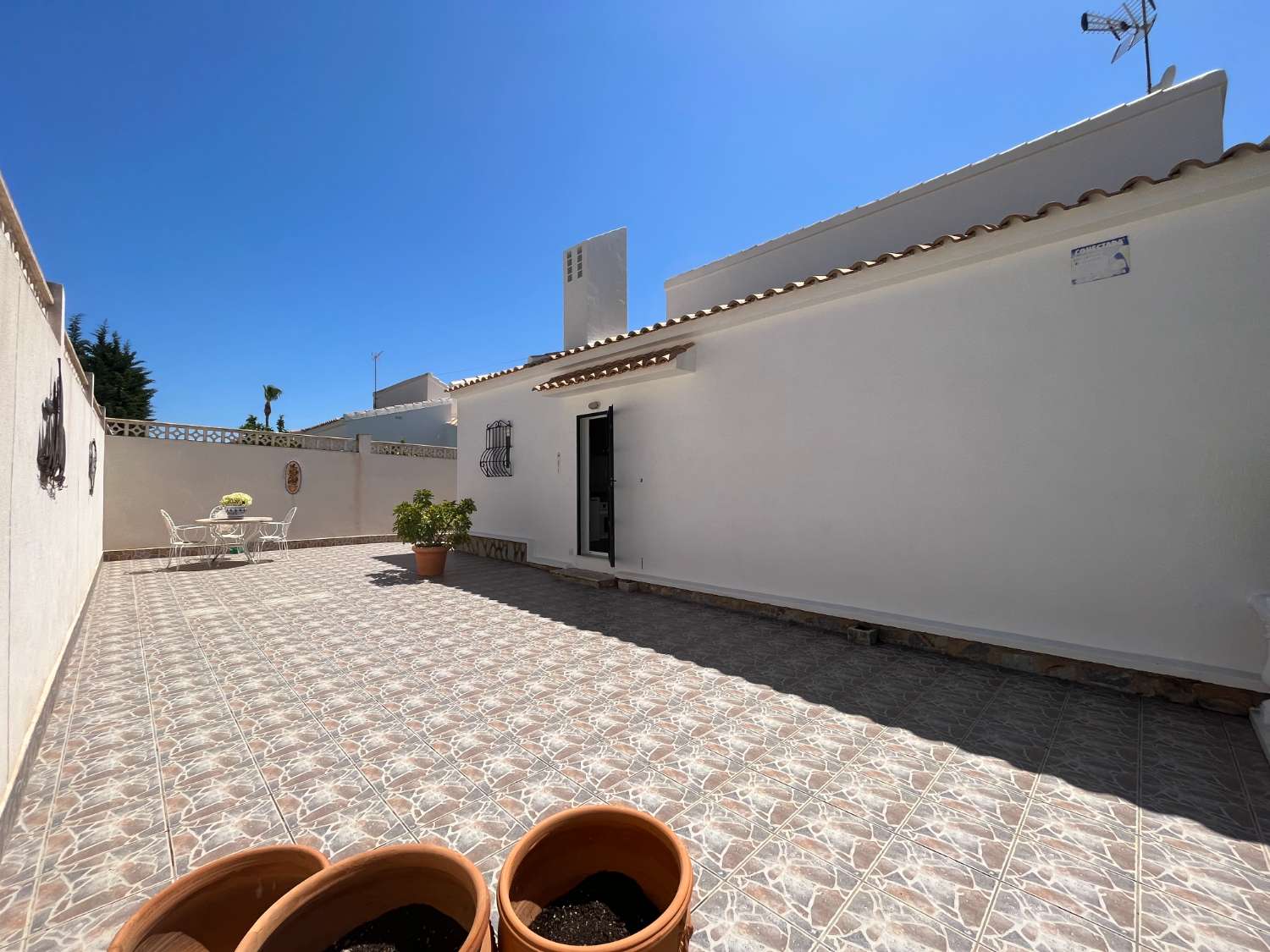 Detached villa distributed on one floor with 2 bedrooms and garage